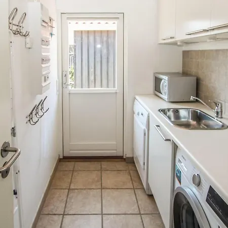 In With Kitchen Hébergement de vacances *